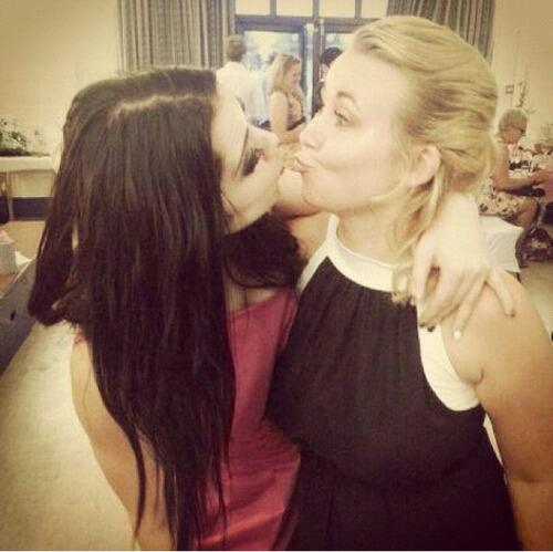 Check out these photos of WWE Diva Paige making out with a girl.