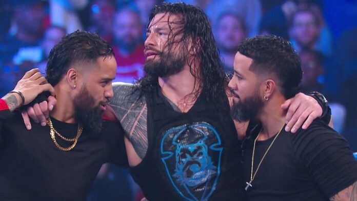 Photos Roman Reigns And The Usos Signing College Football Letters Of 