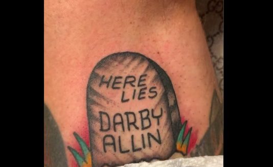 01-brody-king-coffin-tattoo-for-darby-allin-match-aew-2022