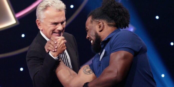 Xavier Woods and Pat Sajak