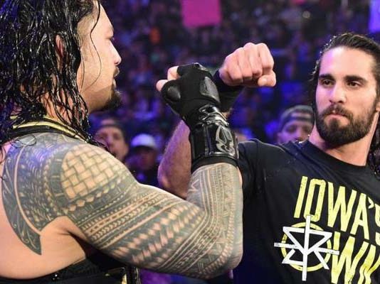 Roman Reigns and Seth Rollins