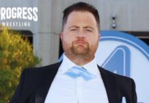 Paul Walter Hauser wears PROGRESS Proteus World Championship at Fantastic Four premiere
