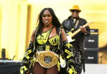 Naomi with her Dad in WWE