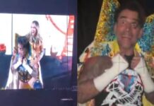 Watch: CM Punk Borrows Charlotte Flair’s Robe During WWE Live Event CM Punk Borrows Charlotte Flair’s Robe