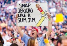 Wrestling Superfan “Sign Guy” Rick Achberger Passes Away Rick Achberger