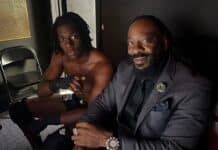Booker T Presents Josiah Jean With WWE ID Contract Josiah Jean - Booker T